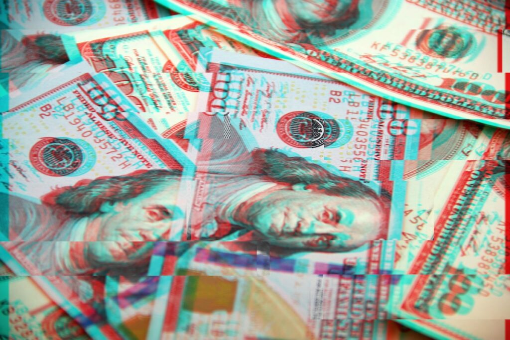 A pile of US dollars with a glitch effect. Open banking can help identify dodgy money.