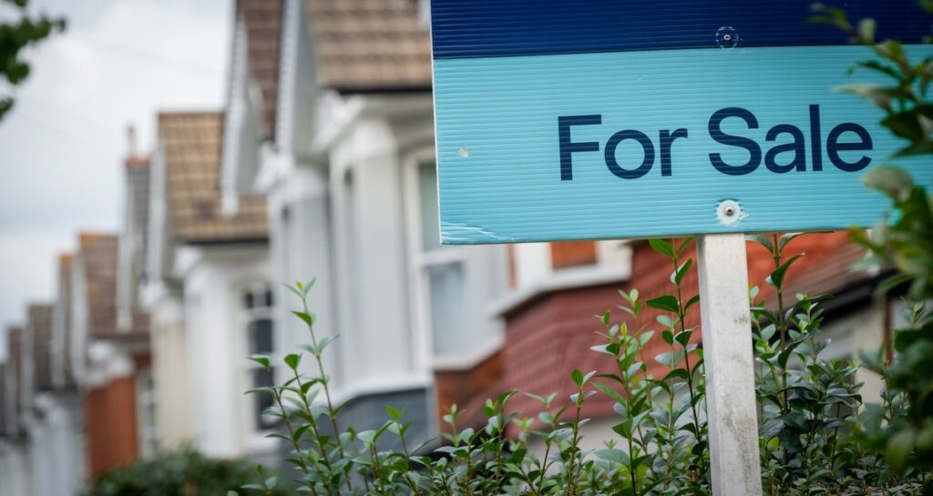 A for sale sign outside terraced houses. There area many things you can do to increase the chance of making a sale.