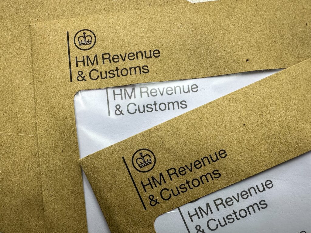 A stack of letters from HM Revenue and Customs. Non-compliance with AML regulations risks heavy HMRC fines.